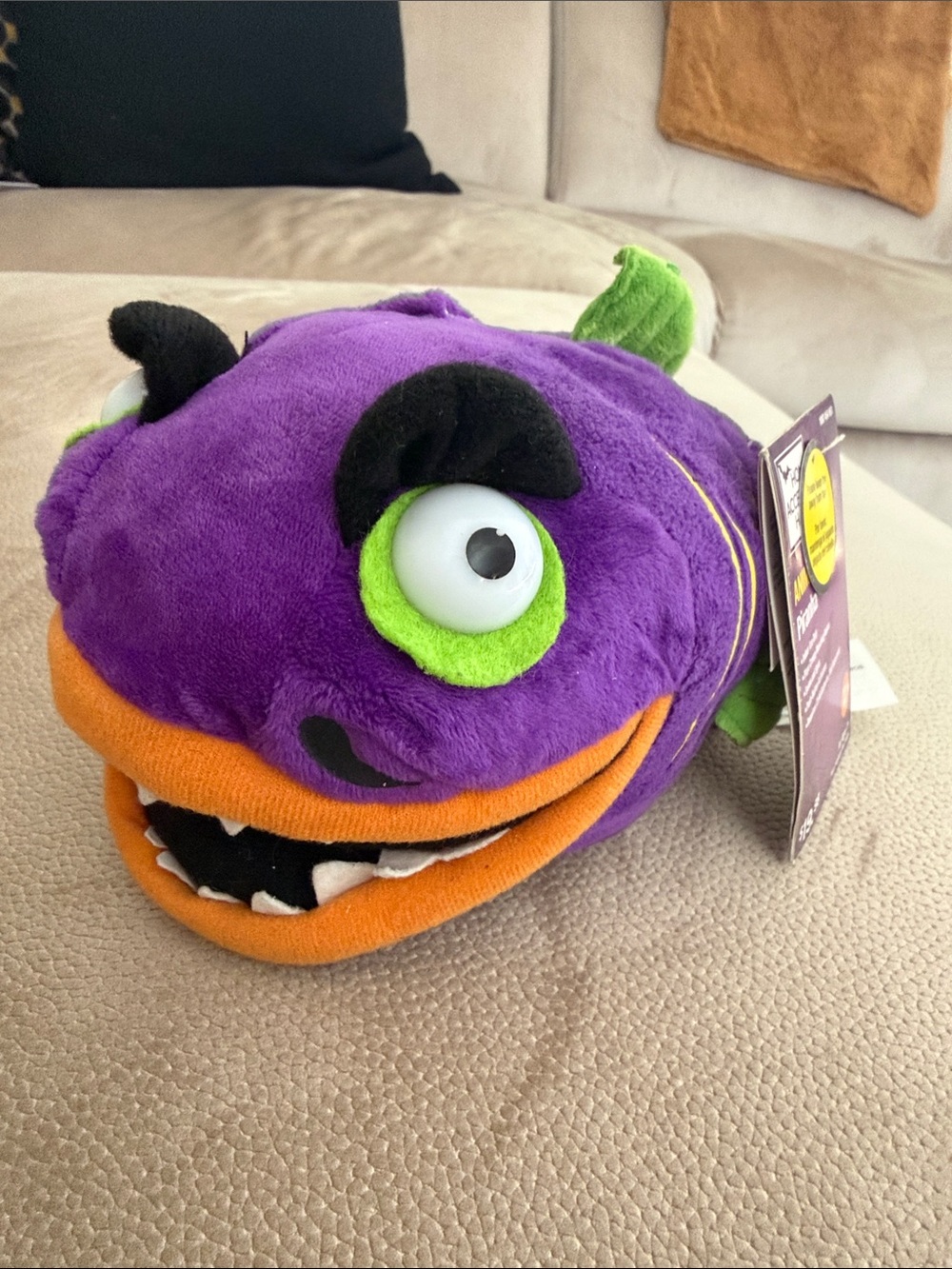 Purple Monster Plush Toy with Orange Mouth and Green Eye Accents